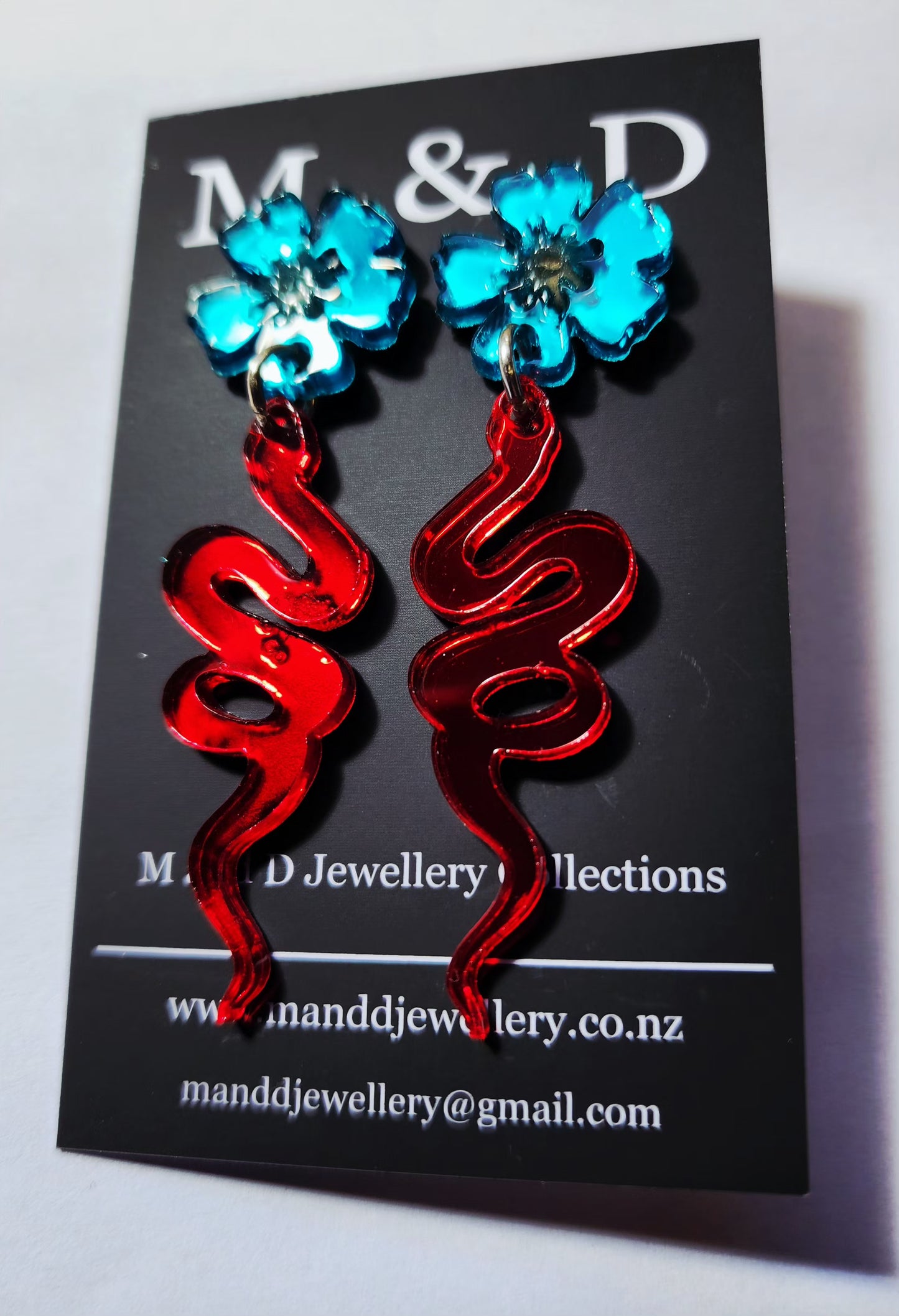 Snake Earrings with Floral Stud