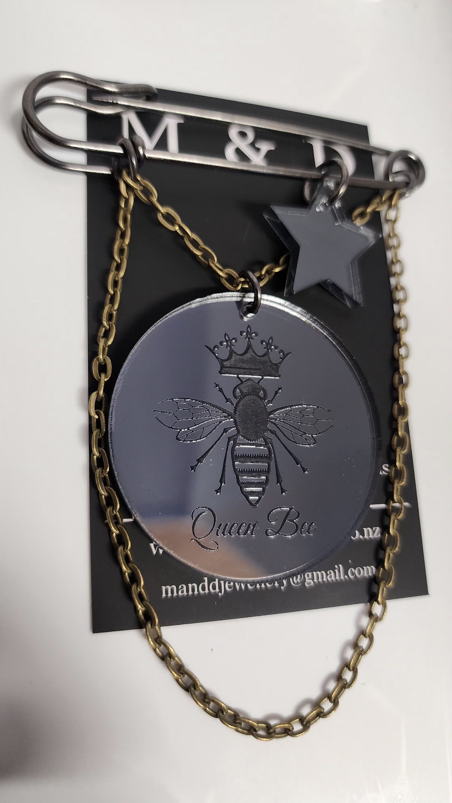 Kilt Pin Queen Bee Engraved Mirror Brooch with chain and star charm detail