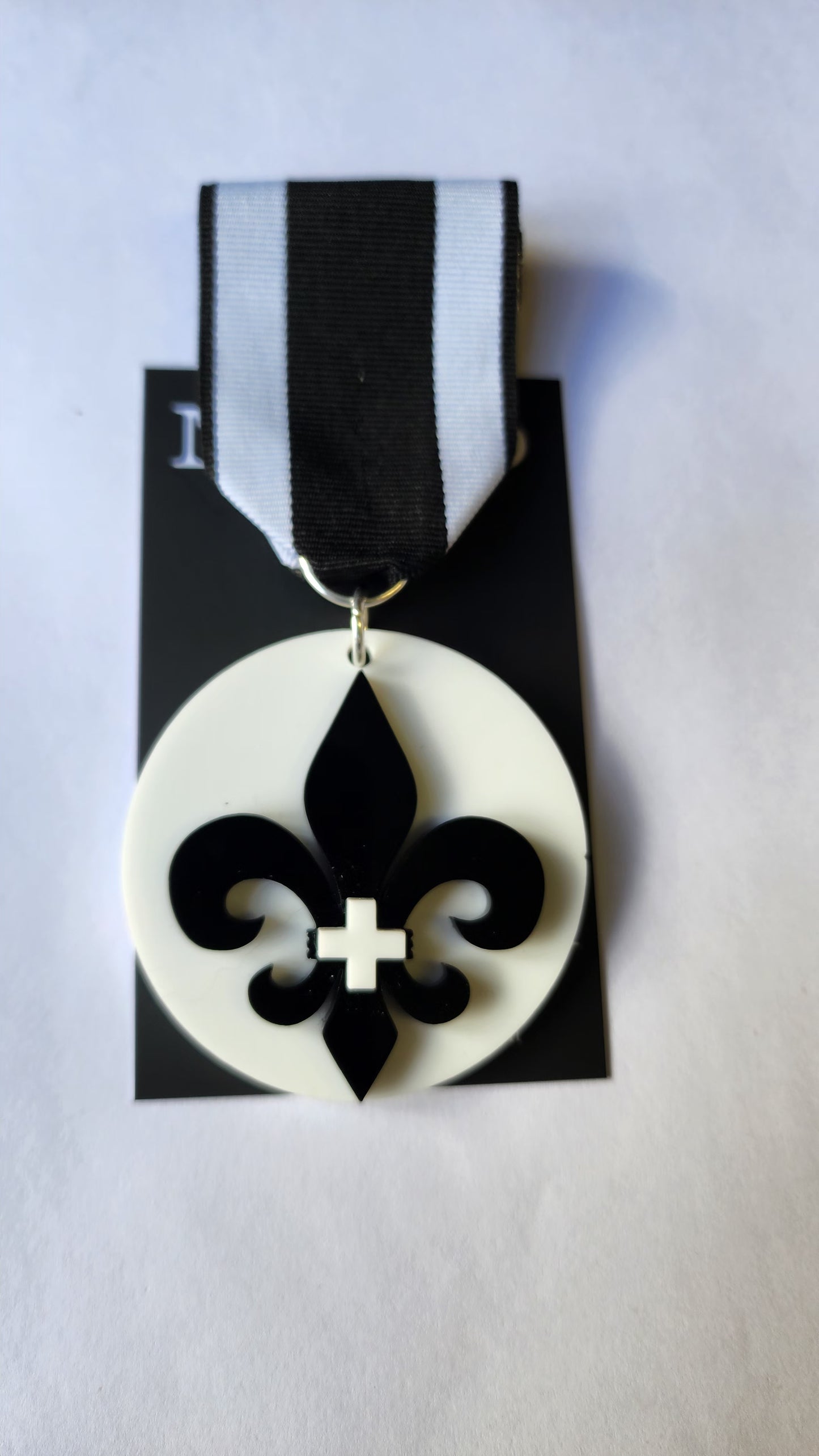 Ribbon Brooch Black Fleur Layered on White Disc
