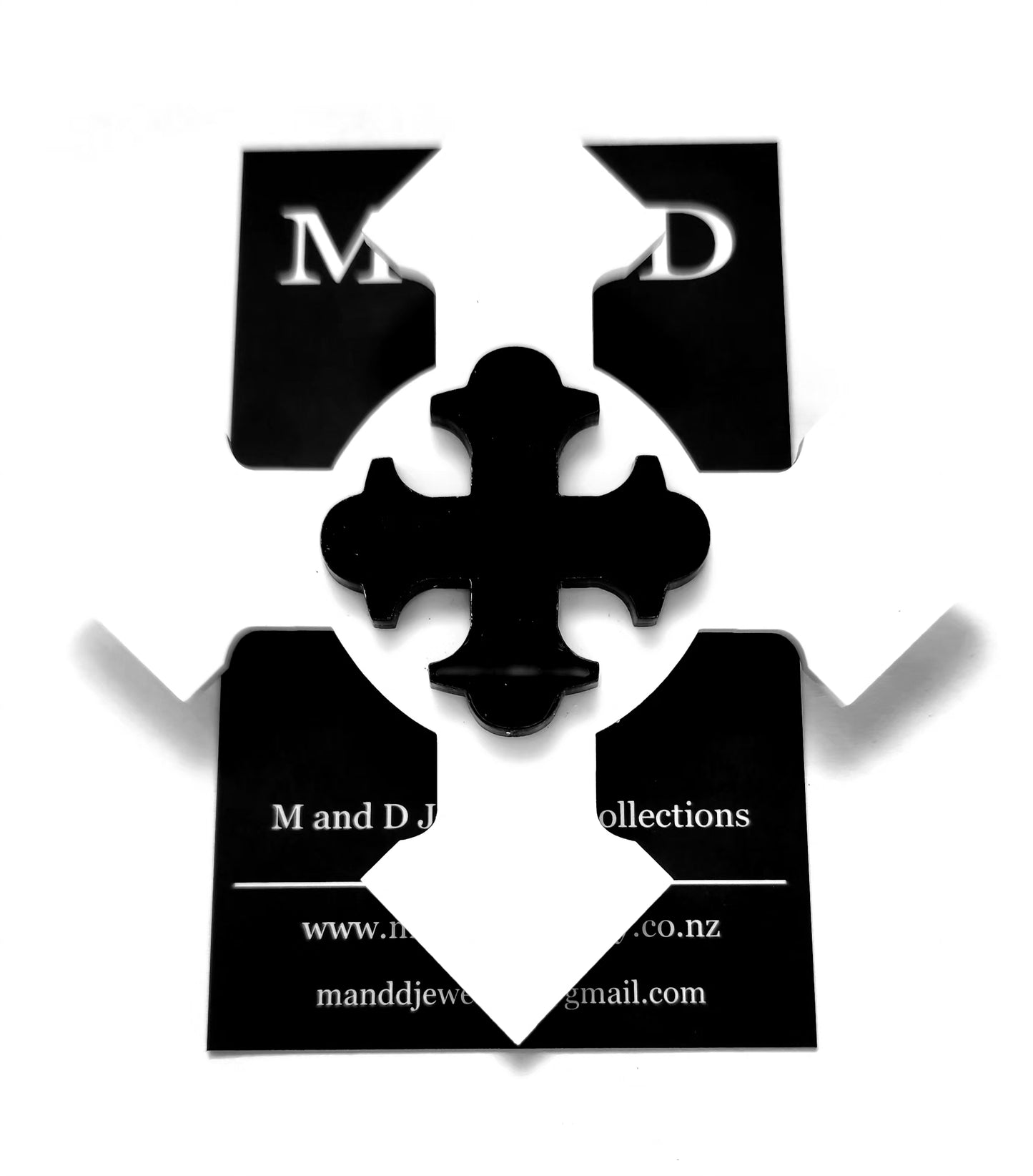 Brooch Large White Botonee Cross with Black layer.