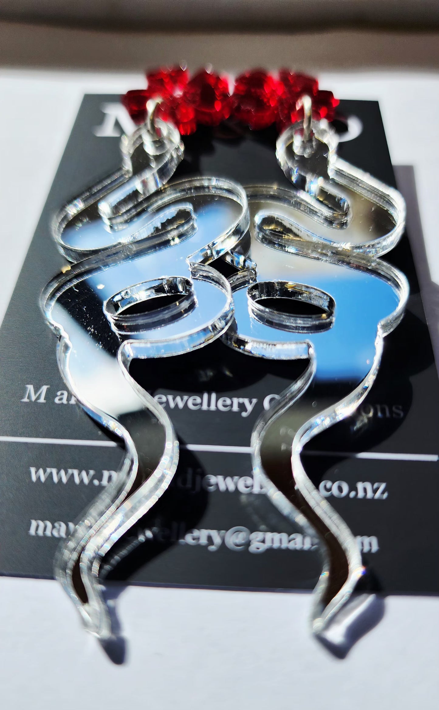 Snake Earrings with Floral Stud