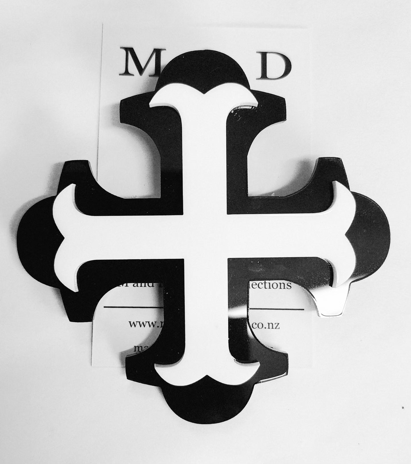 Brooch Large Black Botonee Cross with White bar layer.