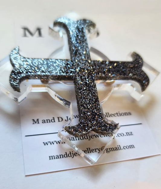 Brooch Large Clear 4 point Cross with Black Glitter Bar layer.