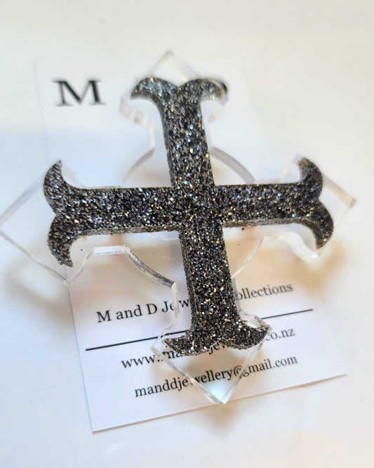 Brooch Large Clear 4 point Cross with Black Glitter Bar layer.