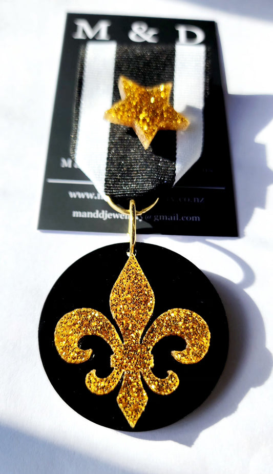 Ribbon Brooch Gold Glitter Fleur Layered on Black Disc with detachable Star Pin