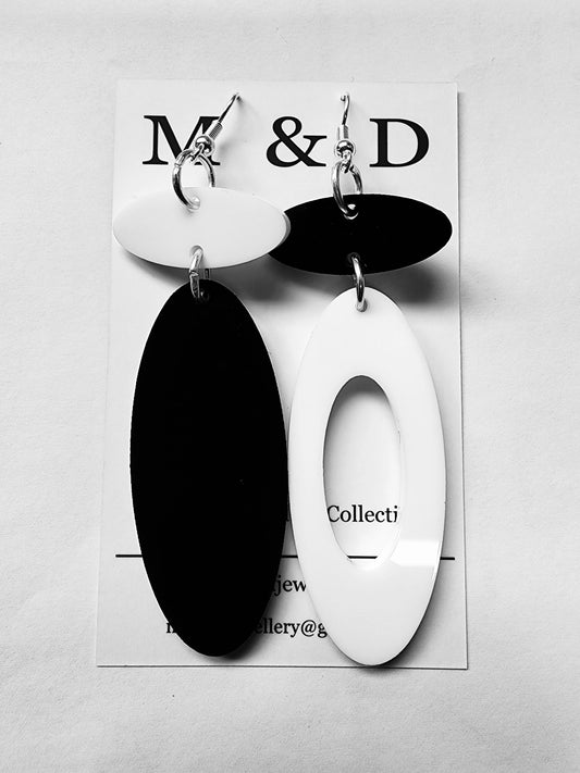 Topsy Turvy Ovals Solid and Hollow Duo Dangle Earrings