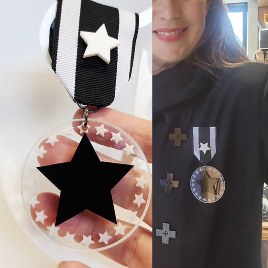 Ribbon Brooch Clear engraved Disc and Black Star and Star pin