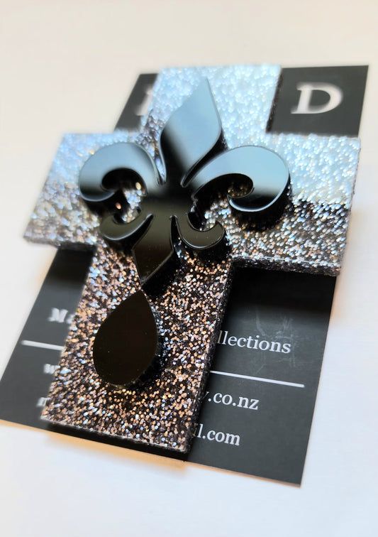 Brooch Black Glitter Cross with Fleur de lis layer.